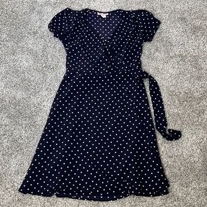 Vintage style navy polka dot wrap dress